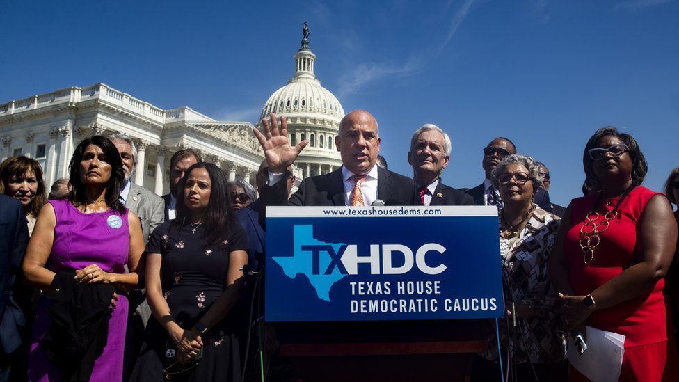 Texas Democrats defy arrest threats after fleeing to block voting law
