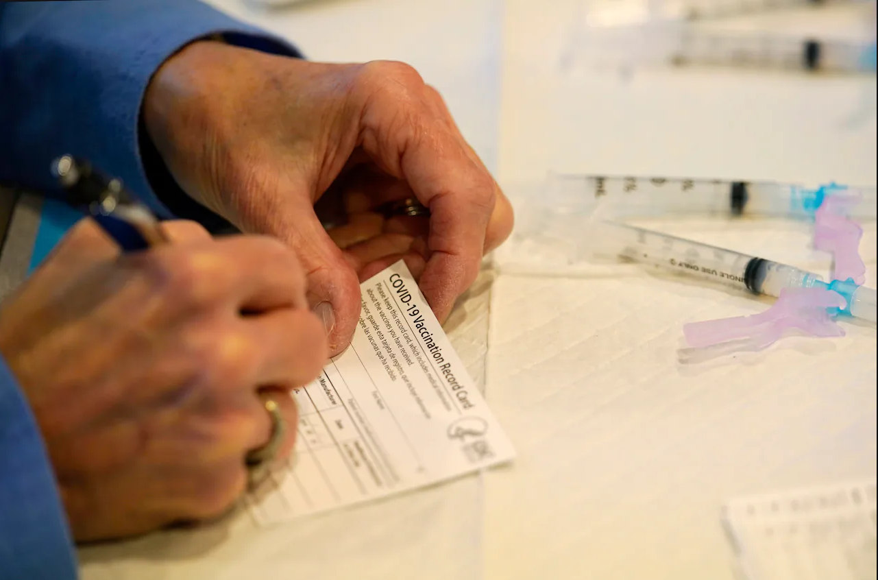 7 arrested for making fake vaccination papers in Georgia