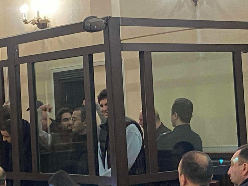 Defense lawyers, supporters walk out of courtroom during hearing on pro-European protesters